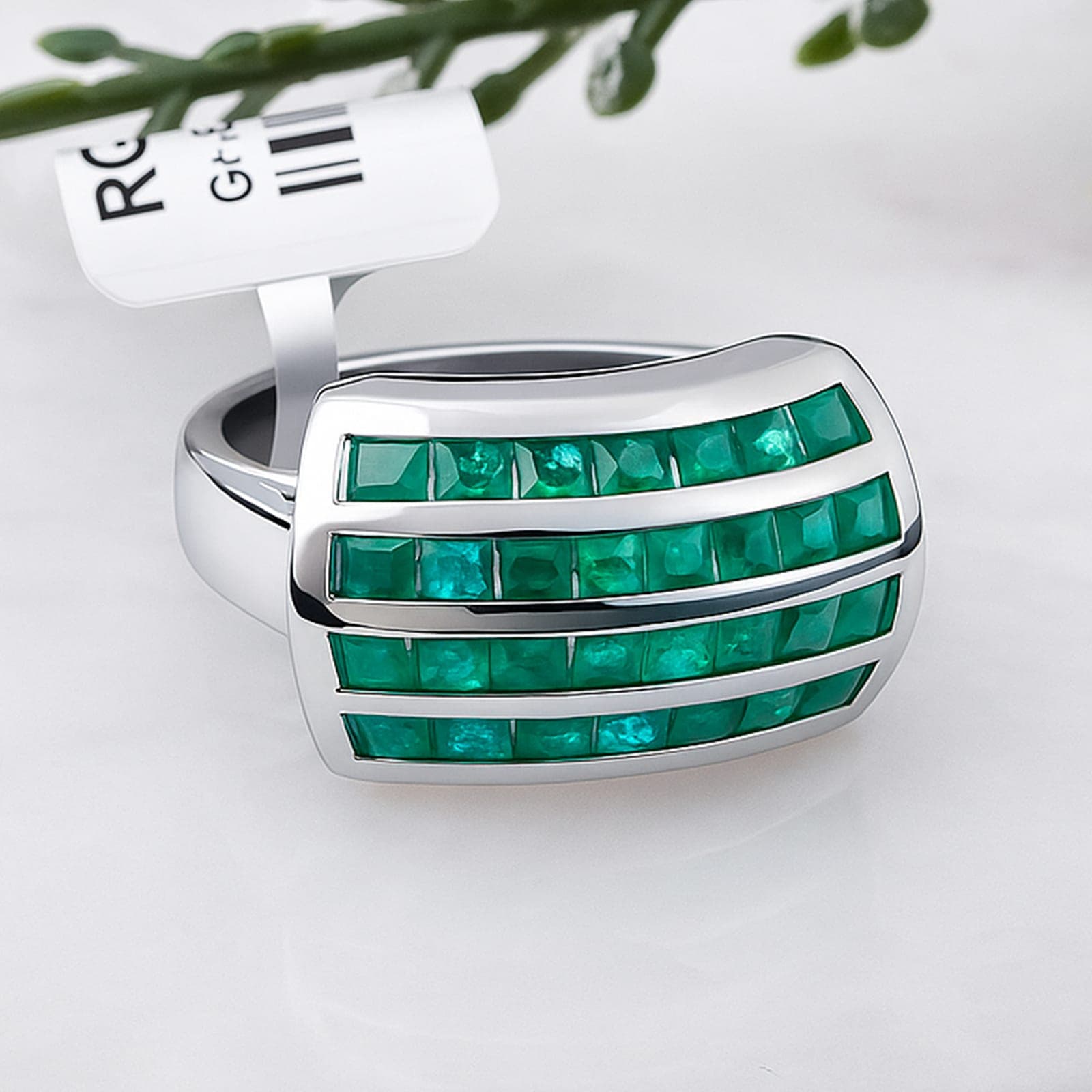 Verdant Curve Emerald Statement Ring