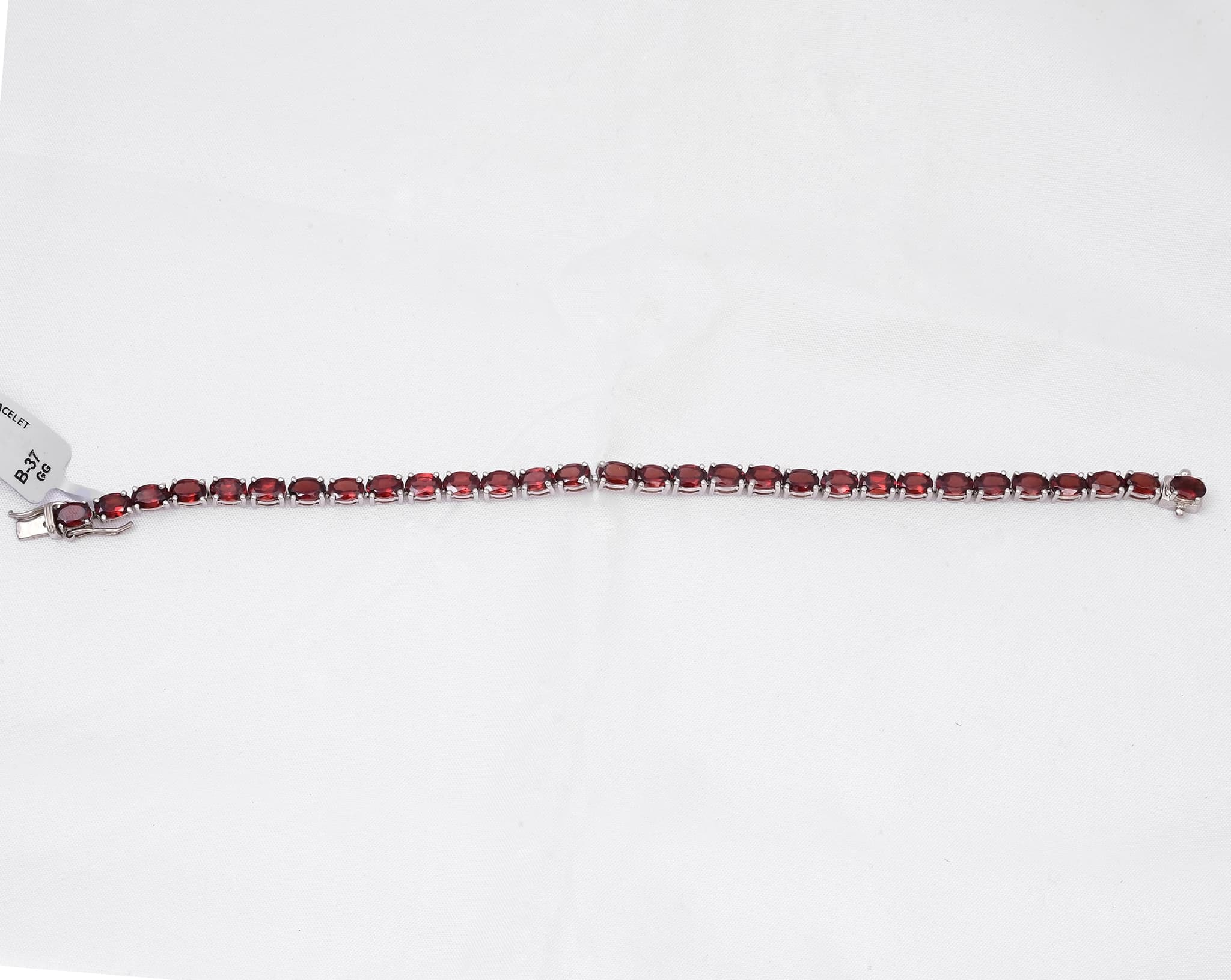 Oval Garnet Tennis Bracelet in Silver