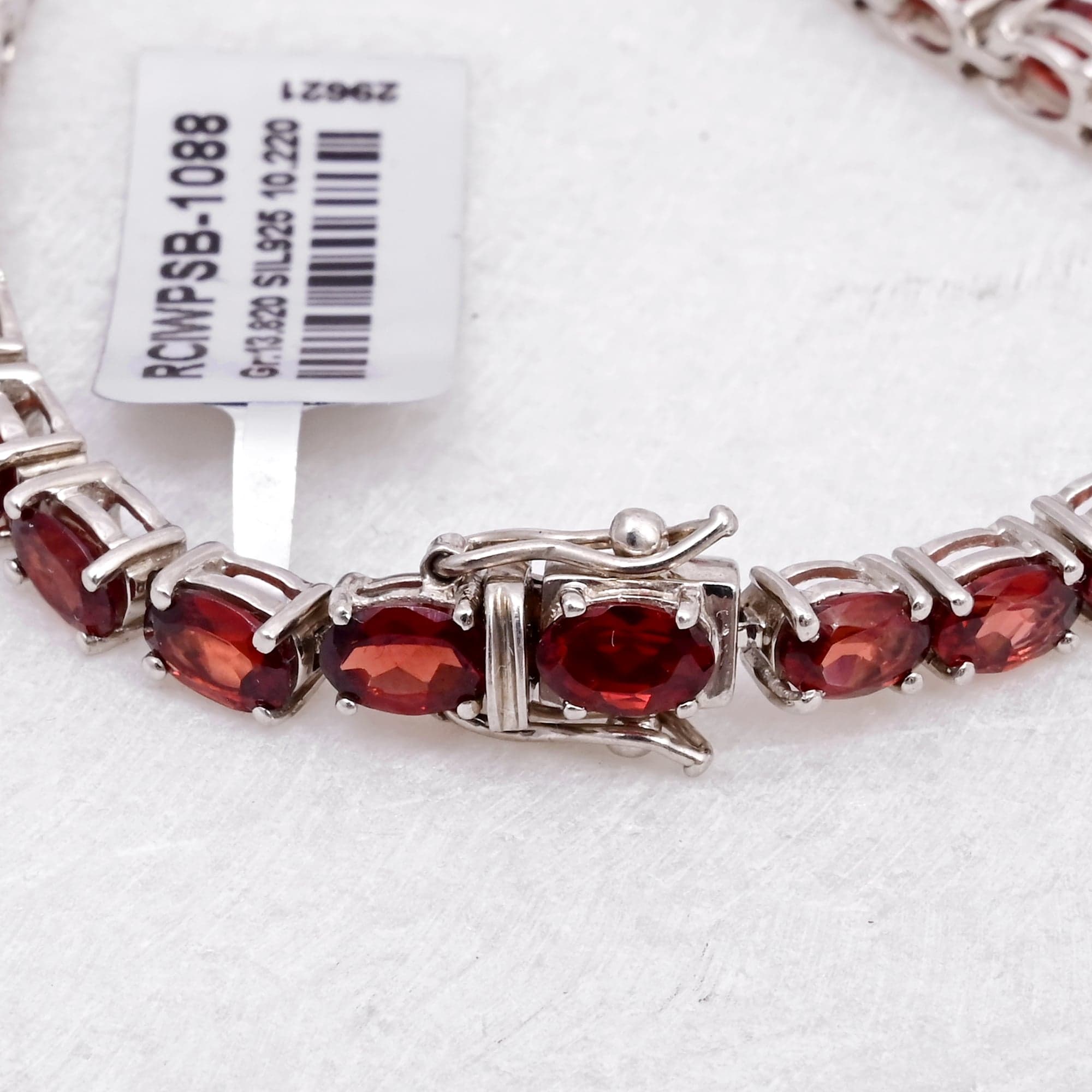Oval Garnet Tennis Bracelet in Silver