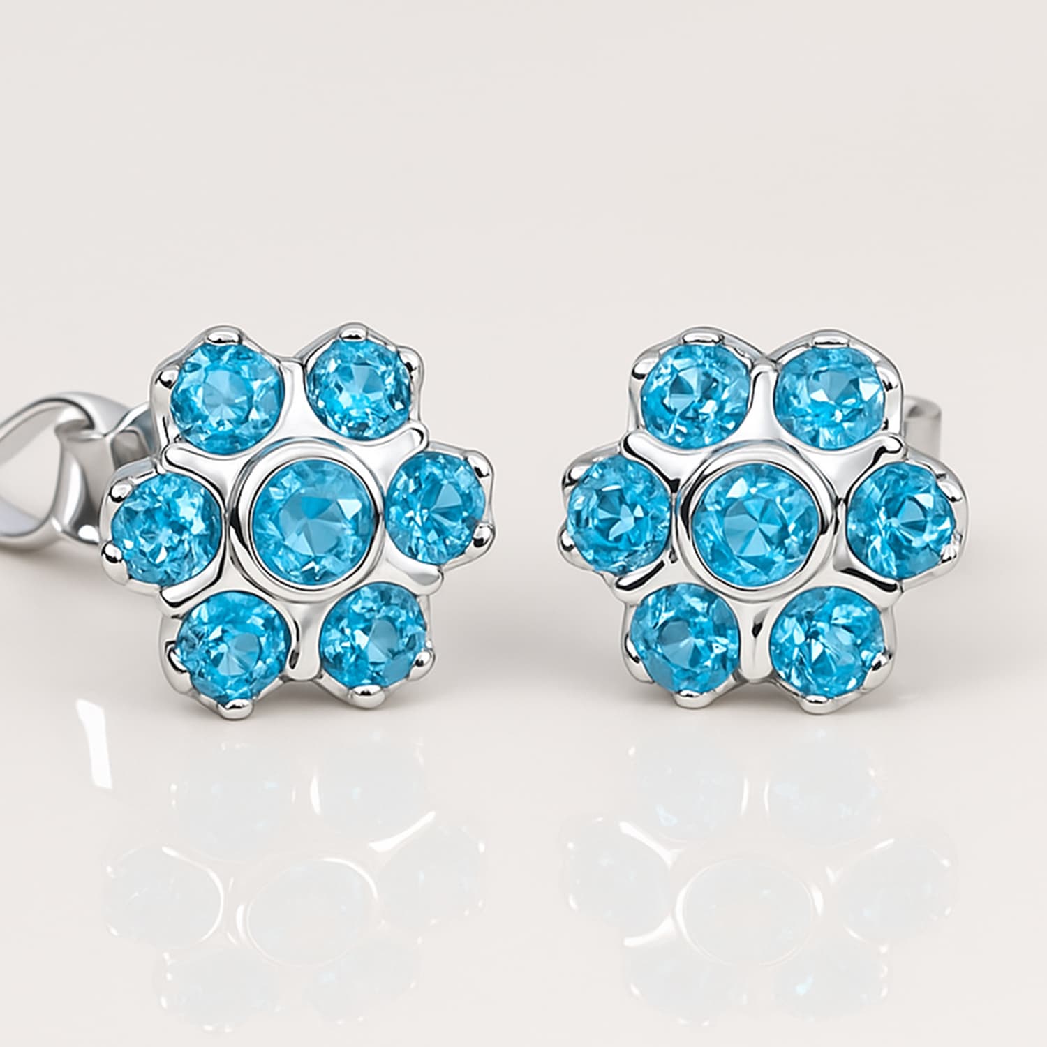 Blue Topaz Floral Stud Earrings in Silver
