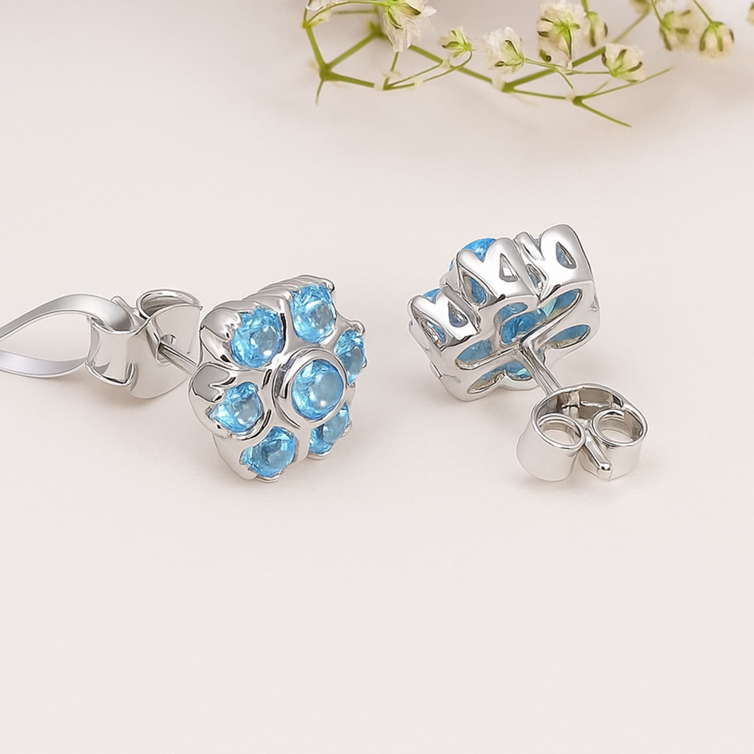 Blue Topaz Floral Stud Earrings in Silver