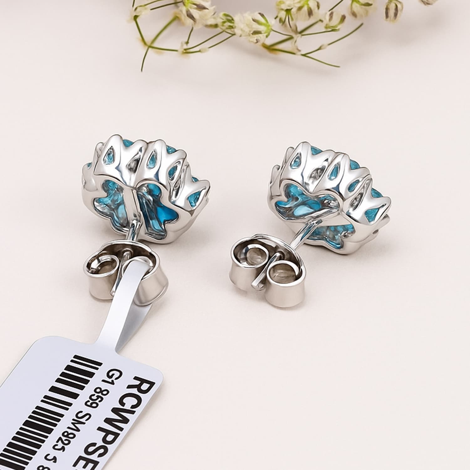 Blue Topaz Floral Stud Earrings in Silver