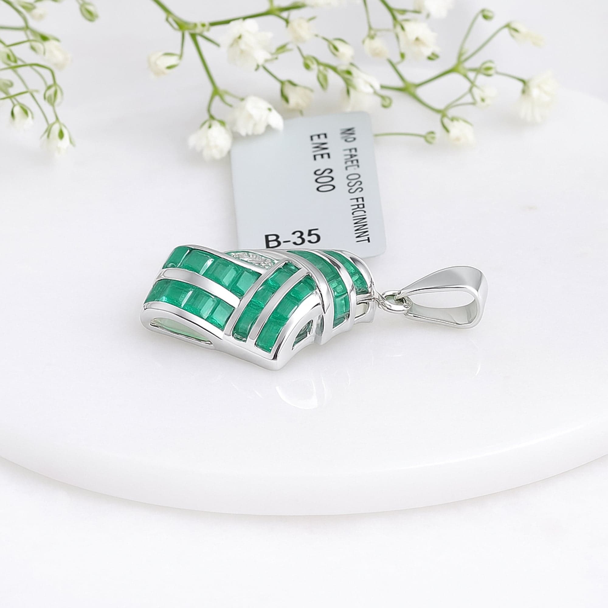 Emerald Weave Elegance Pendant