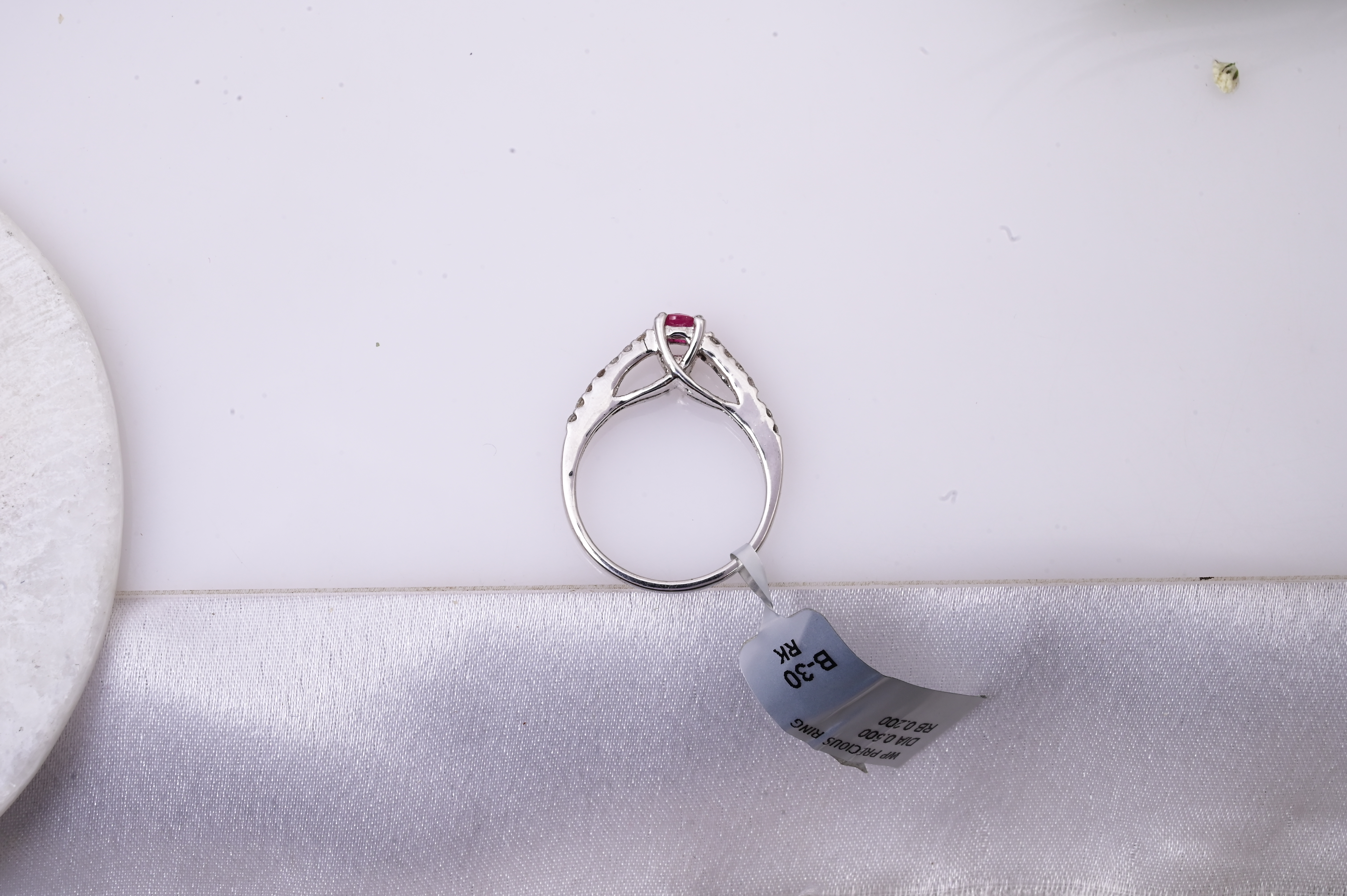 Ruby Solitaire Twist Ring