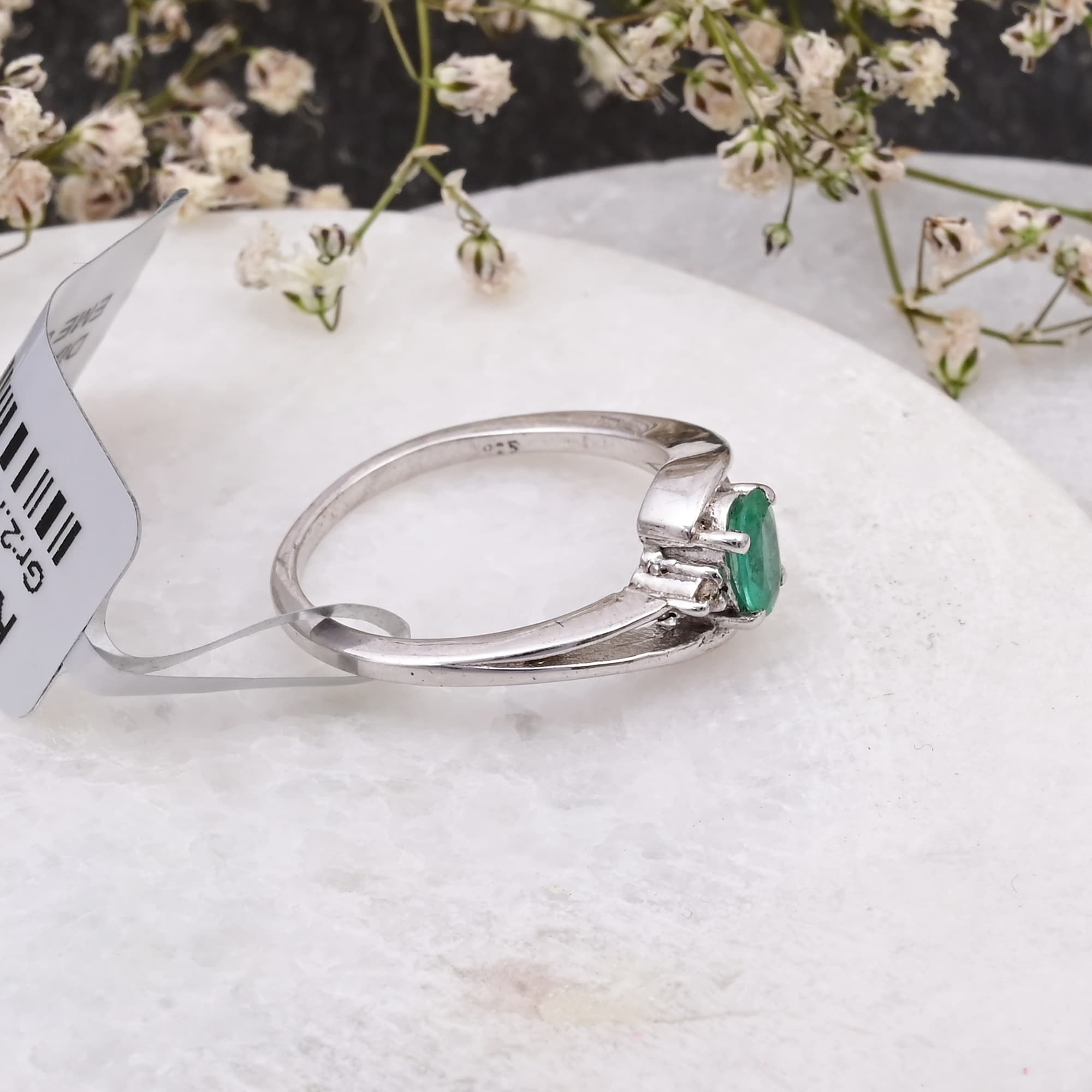 Emerald Whisper Twist Ring
