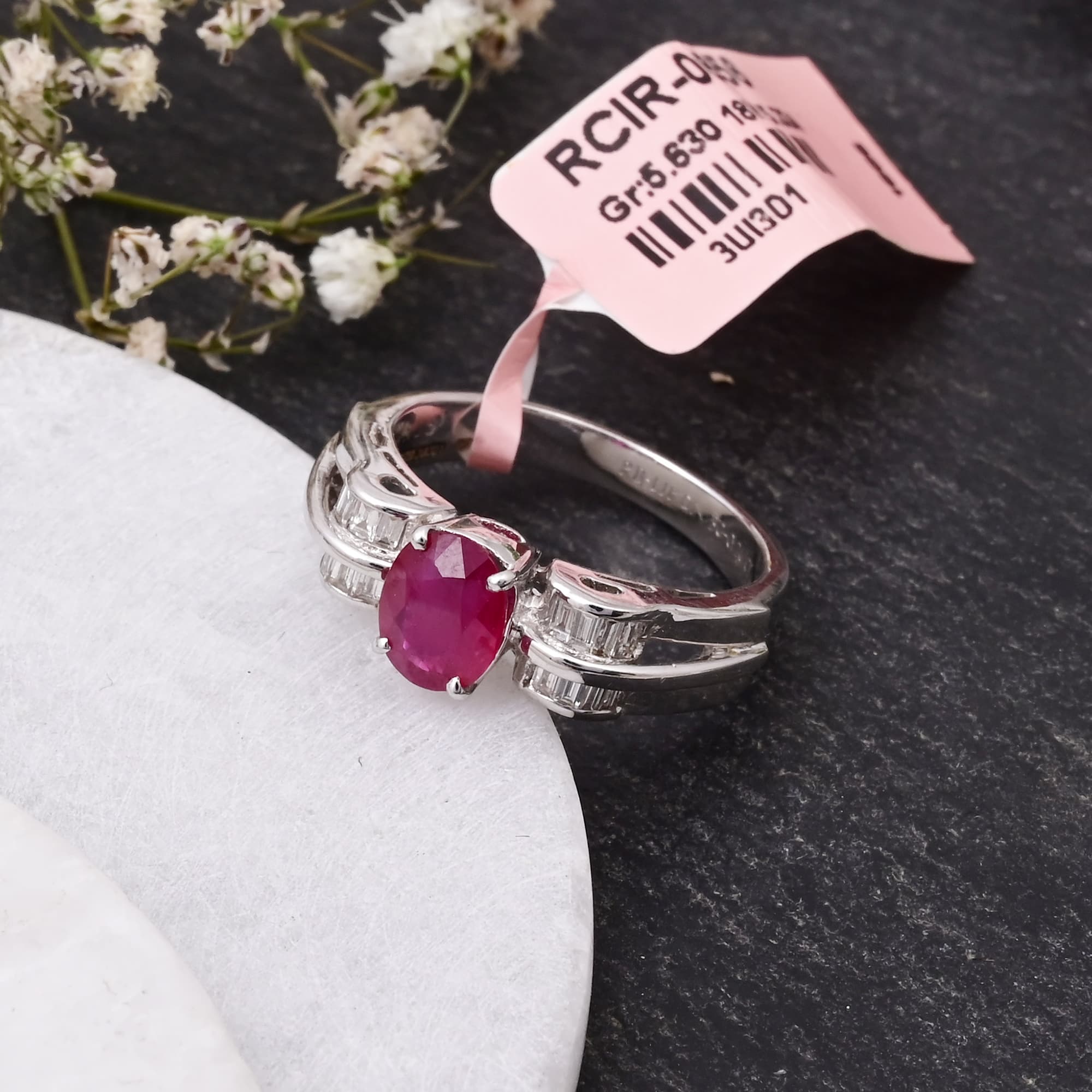 Regal Ruby Baguette Diamond Ring