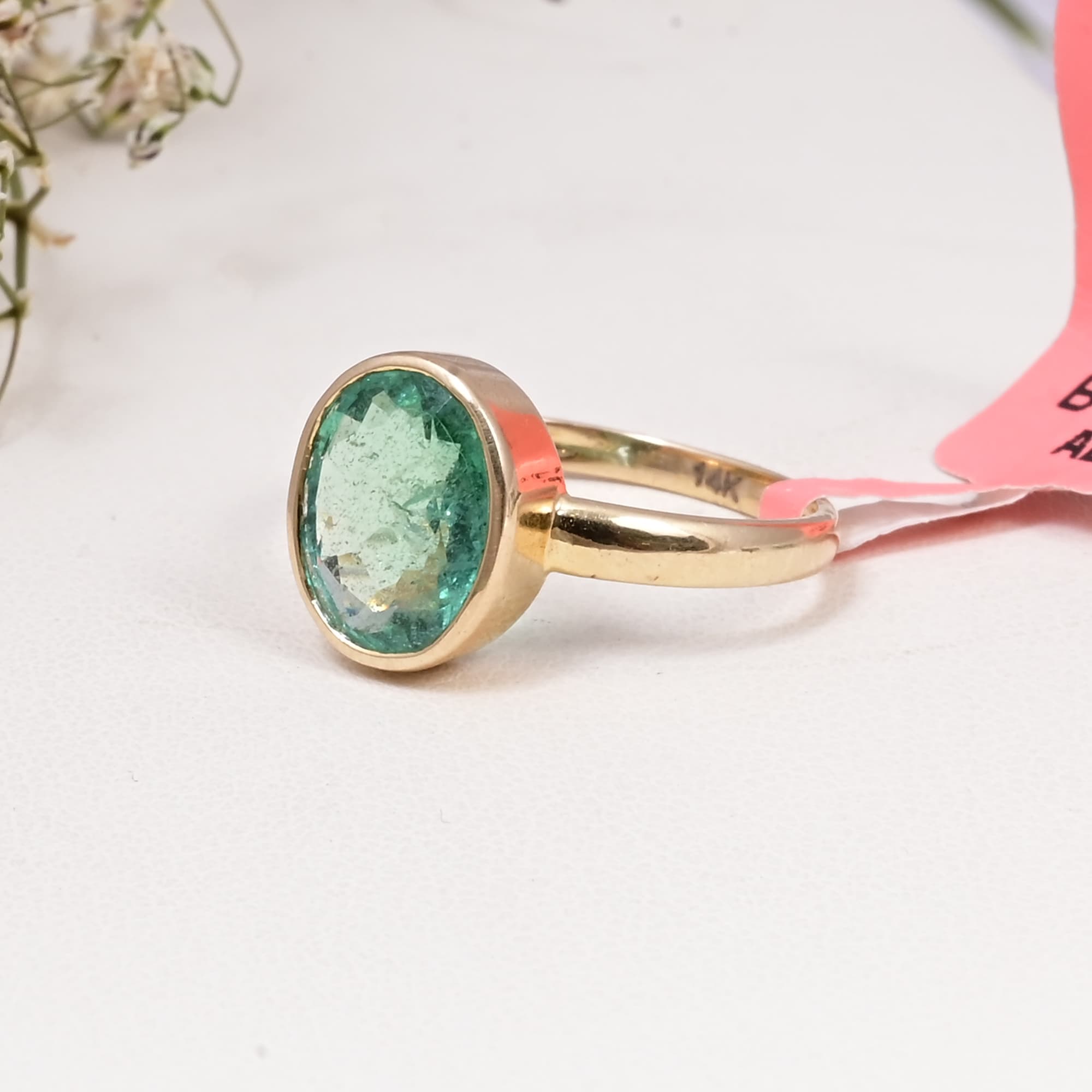 Verdant Bezel Emerald Solitaire Ring