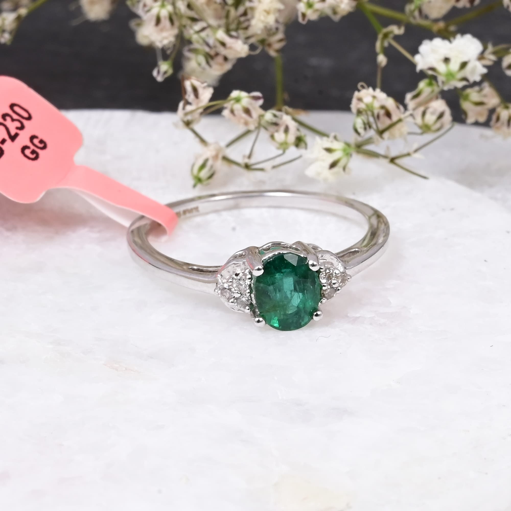 Emerald Whisper Solitaire Ring