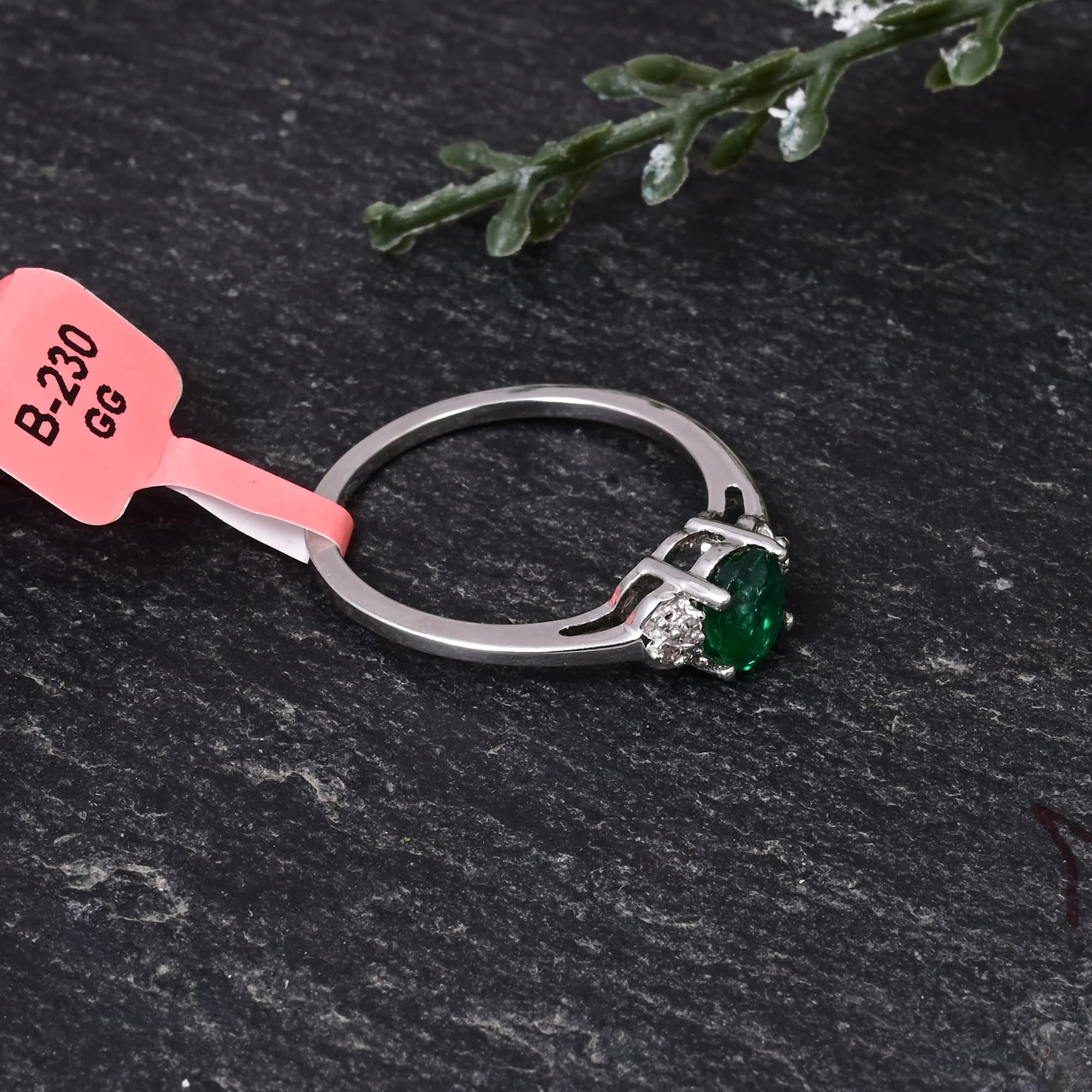 Emerald Whisper Solitaire Ring