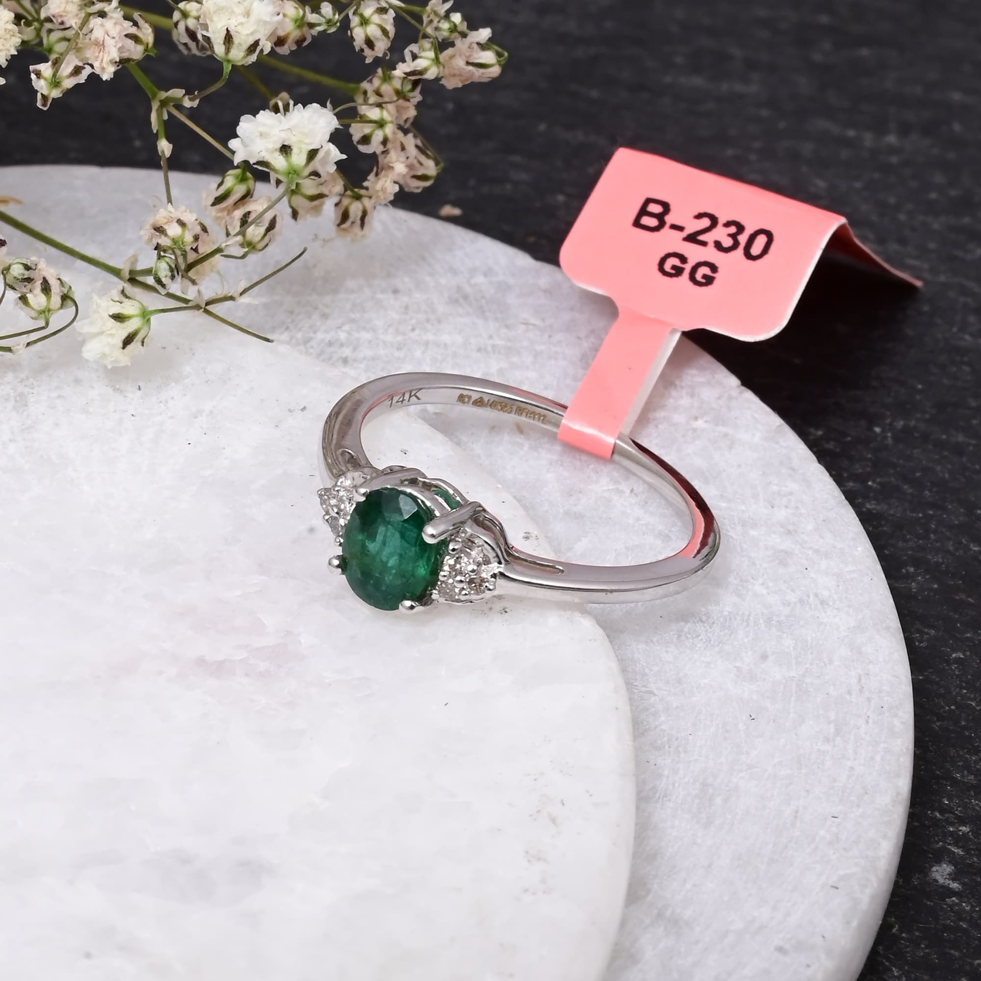 Emerald Whisper Solitaire Ring