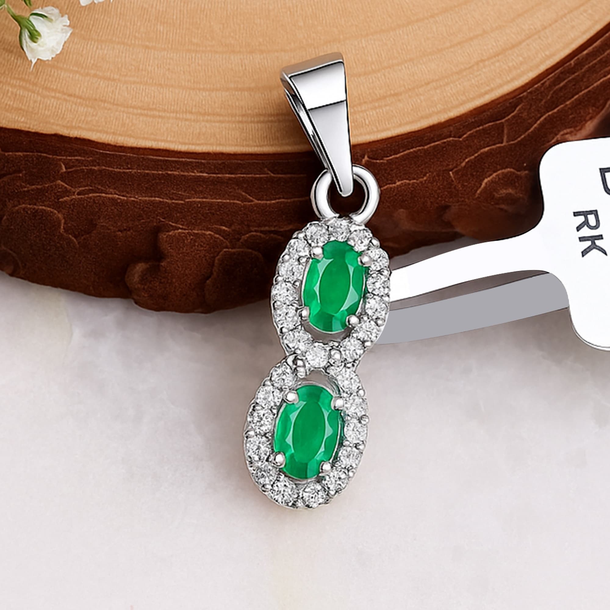 Emerald Diamond Infinity Halo Pendant