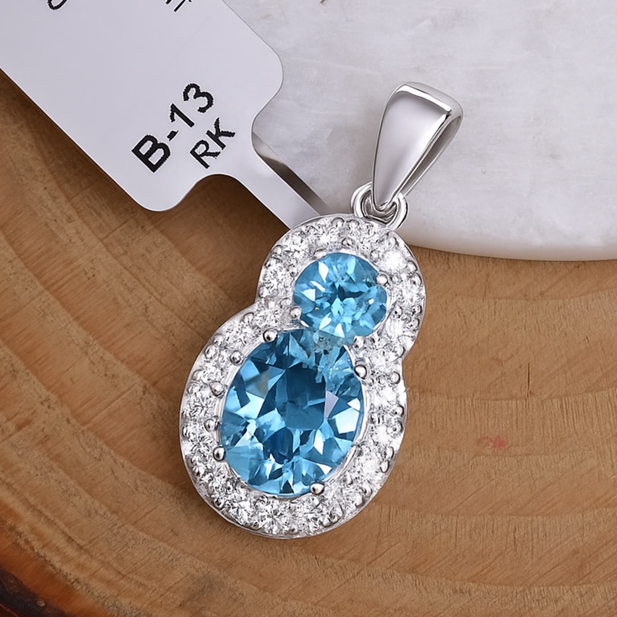 Azure Halo Blue Topaz Pendant