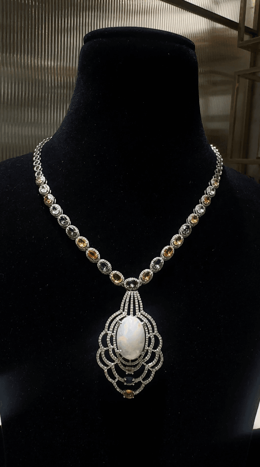 Opaline Rêverie — opal centerpiece with multi sapphires
